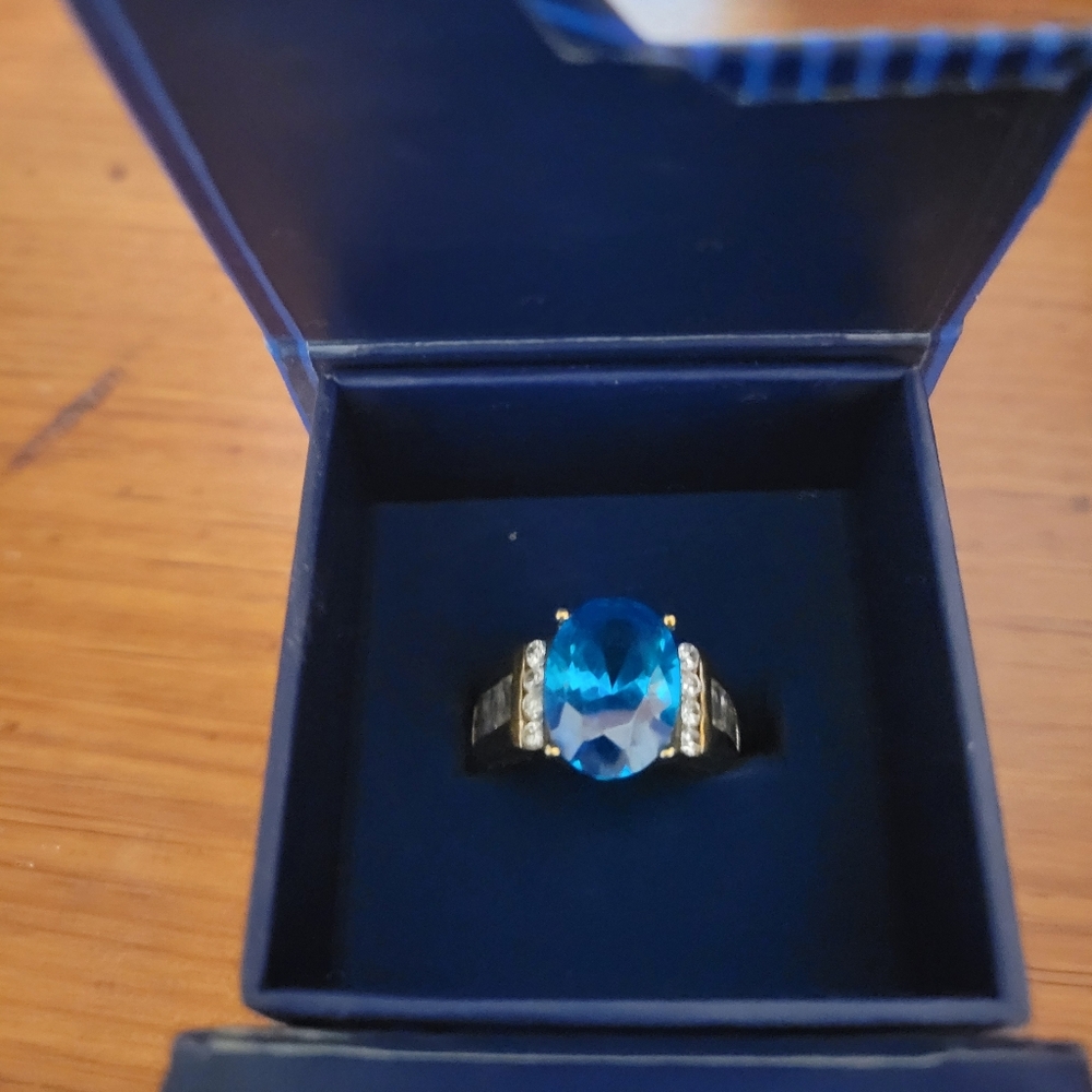 Elegant Blue Topaz Gemstone Ring With Simulated Diamonds